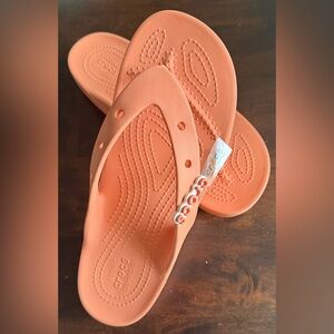 NWOT CROCS Iconic Peach Slides Size 9